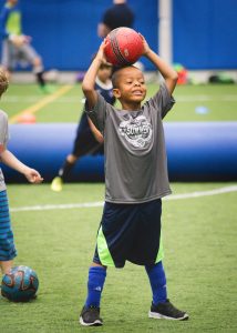 Kids soccer skills training session on indoor turf at Westmont Yard in DuPage County IL