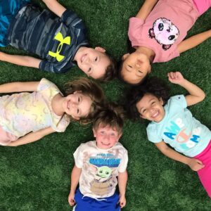 FUN Camp children playing sports on the indoor turf field at Westmont Yard in Westmont IL