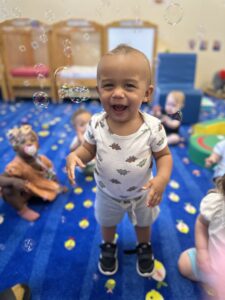 Bright and cheerful infant care room for babies 6 weeks to 15 months at Active Childcare Westmont Yard